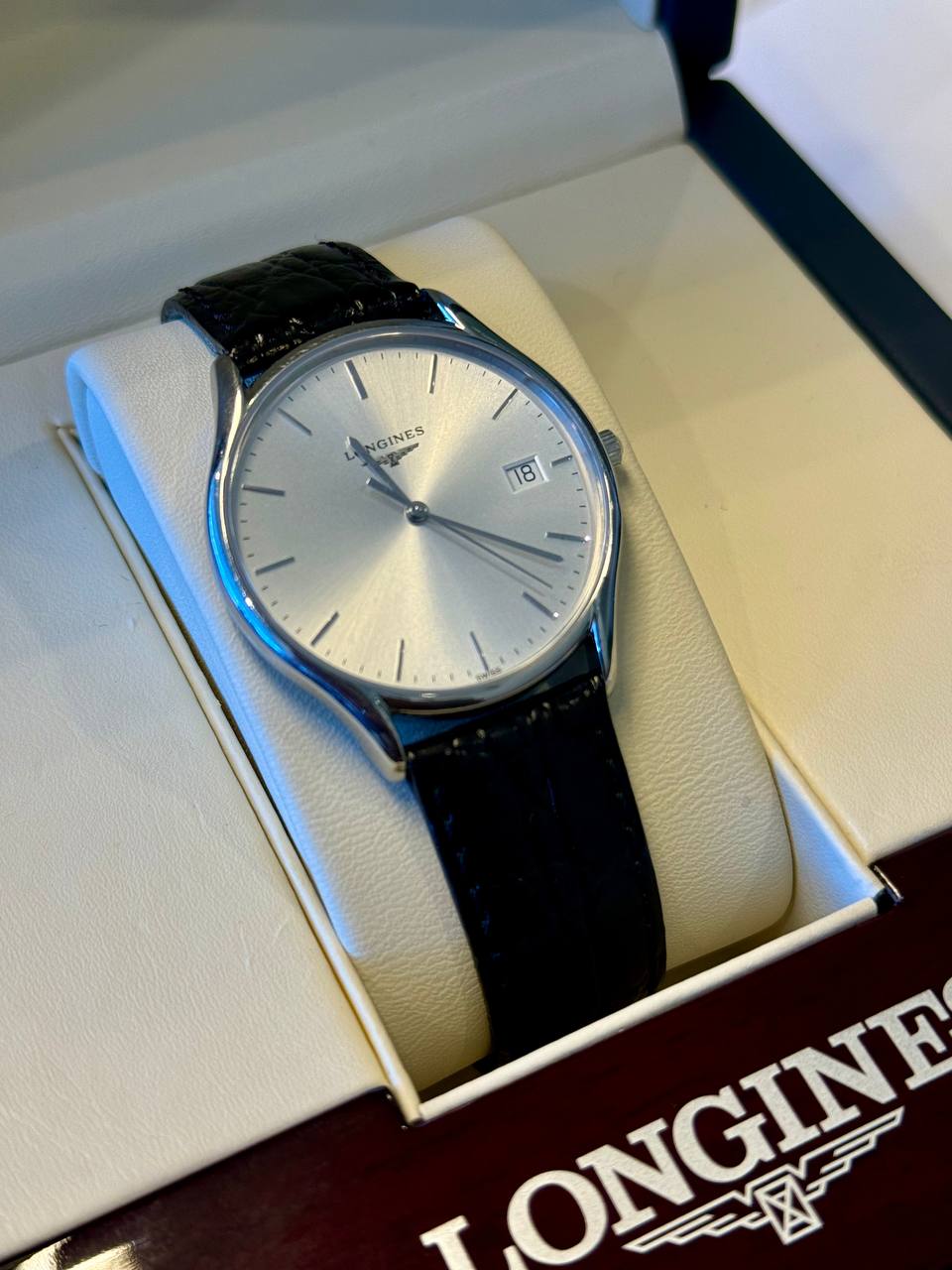 Longines L4.759.4 silver dial and black leather strap — standardized white background