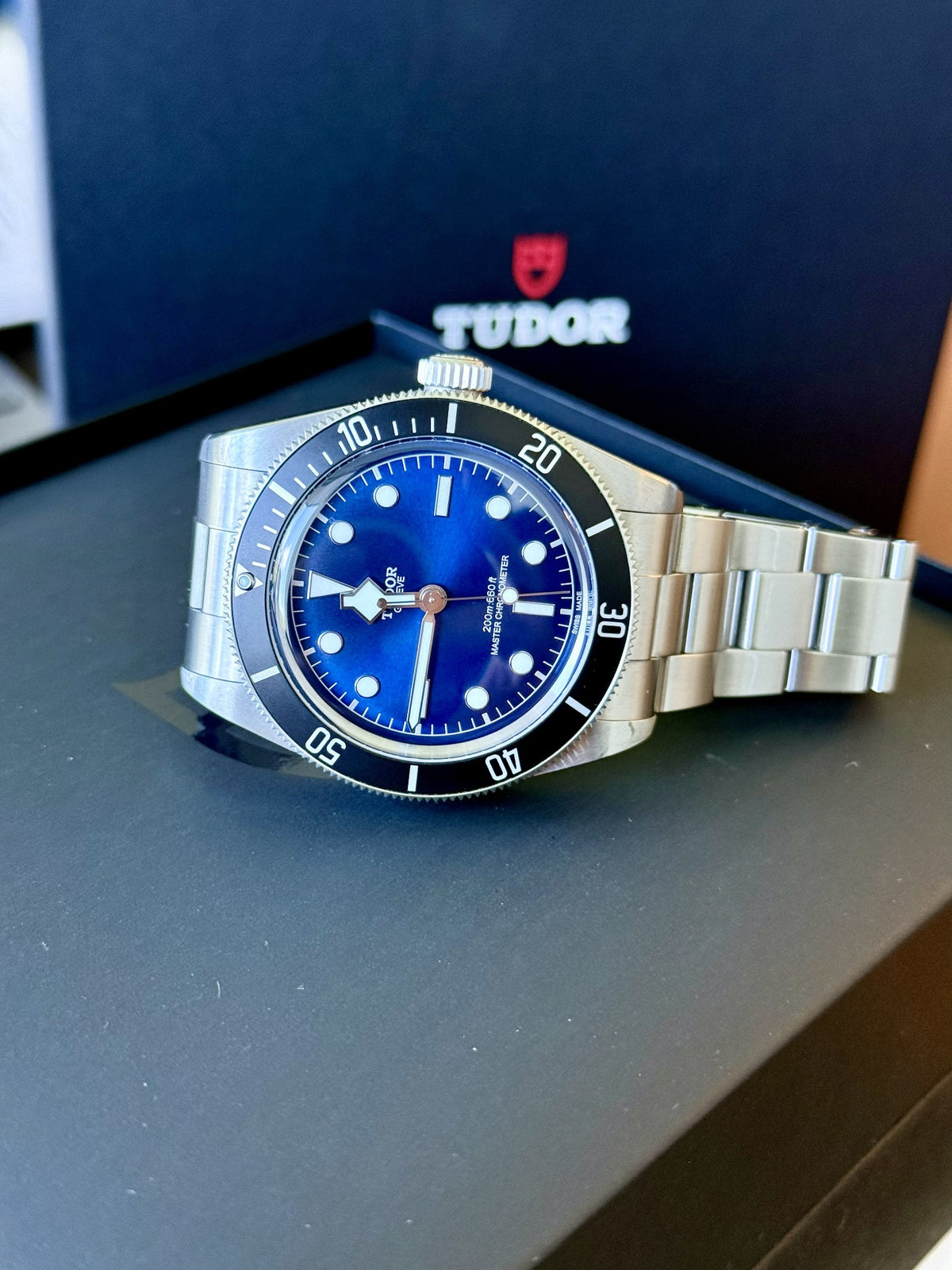 Tudor Black Bay 68 front view with Tudor box